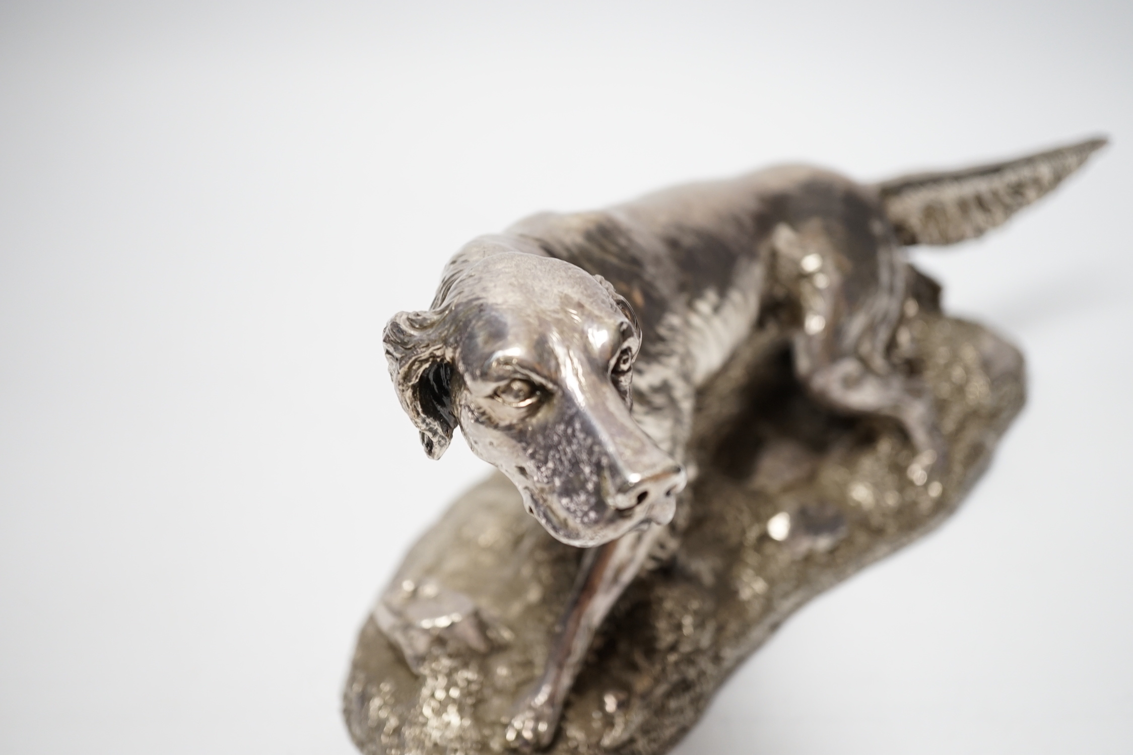 A modern filled silver model of an Irish Setter, by Camelot Silver Ltd, after Giuseppe Griecco?, Sheffield, 1998, length 31cm.